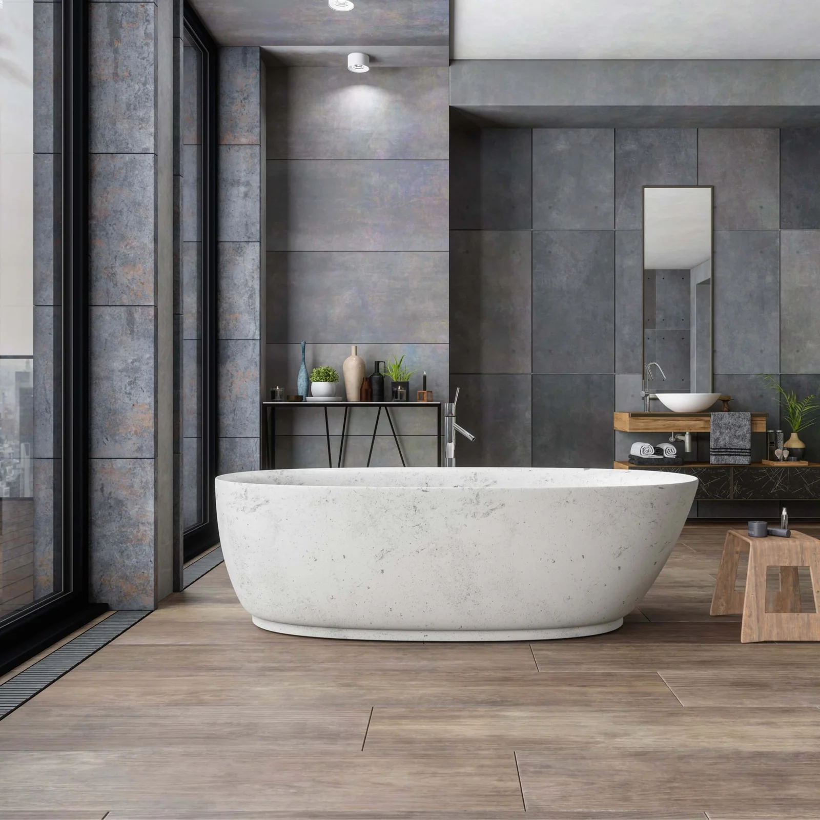 A modern bathroom with a large bathtub and gray tiles